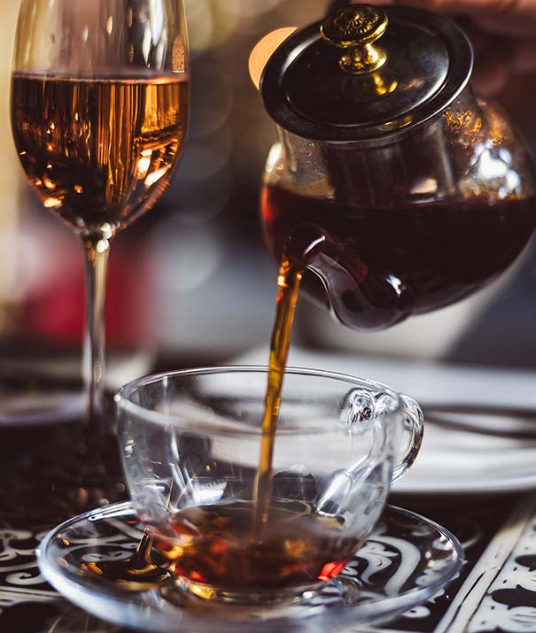 Breakfast tea served alongside rose champagne at a signature Crazy Bear Afternoon Tea